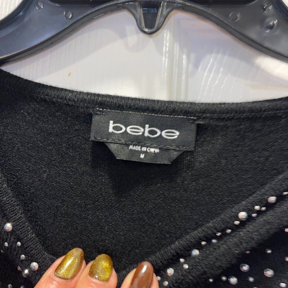 BEBE Black Sweater Dress with Keyhole cut out. Size Medium - Picture 3 of 6